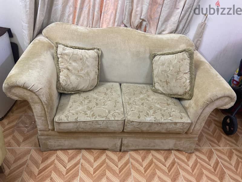 2 seater sofa with two pillows 0