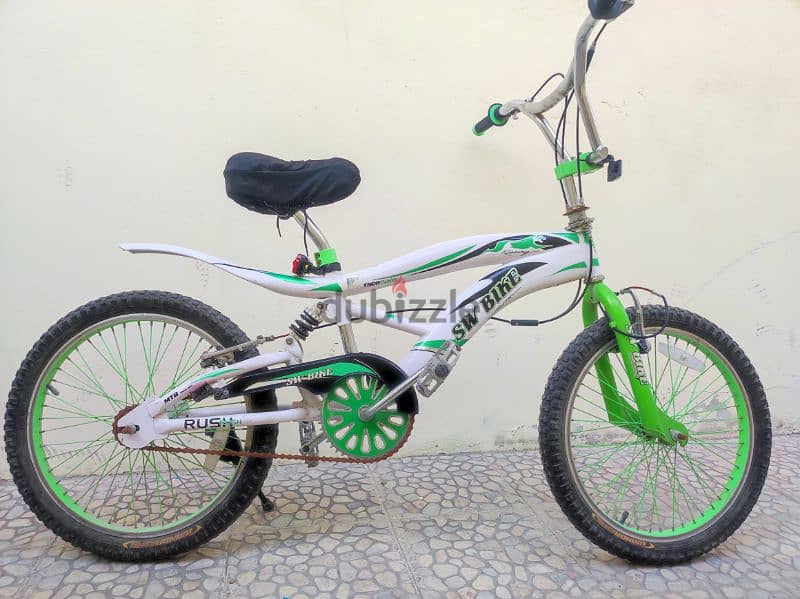 Bicycle with helmet and pump for sale 0