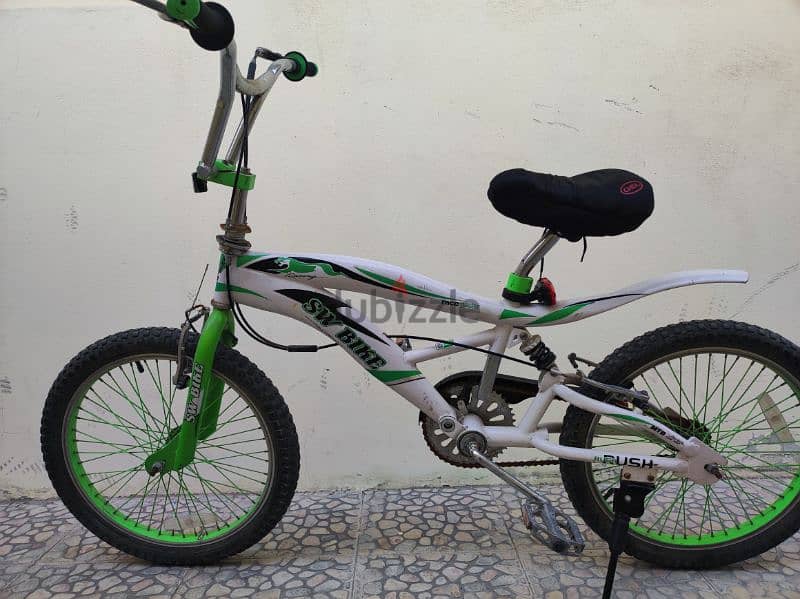 Bicycle with helmet and pump for sale 1