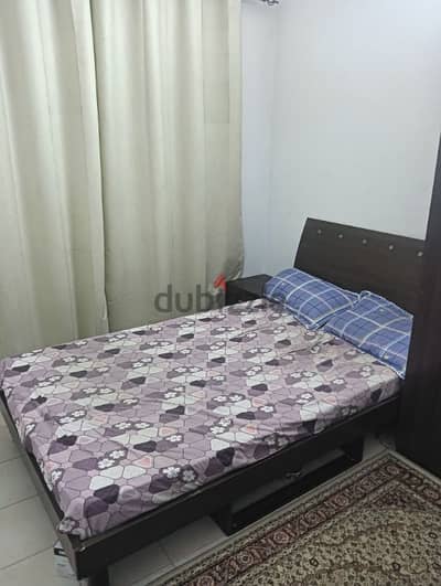 double bed mattress with side table