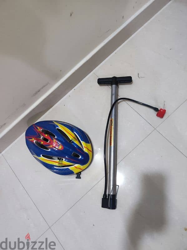 Bicycle with helmet and pump for sale 2