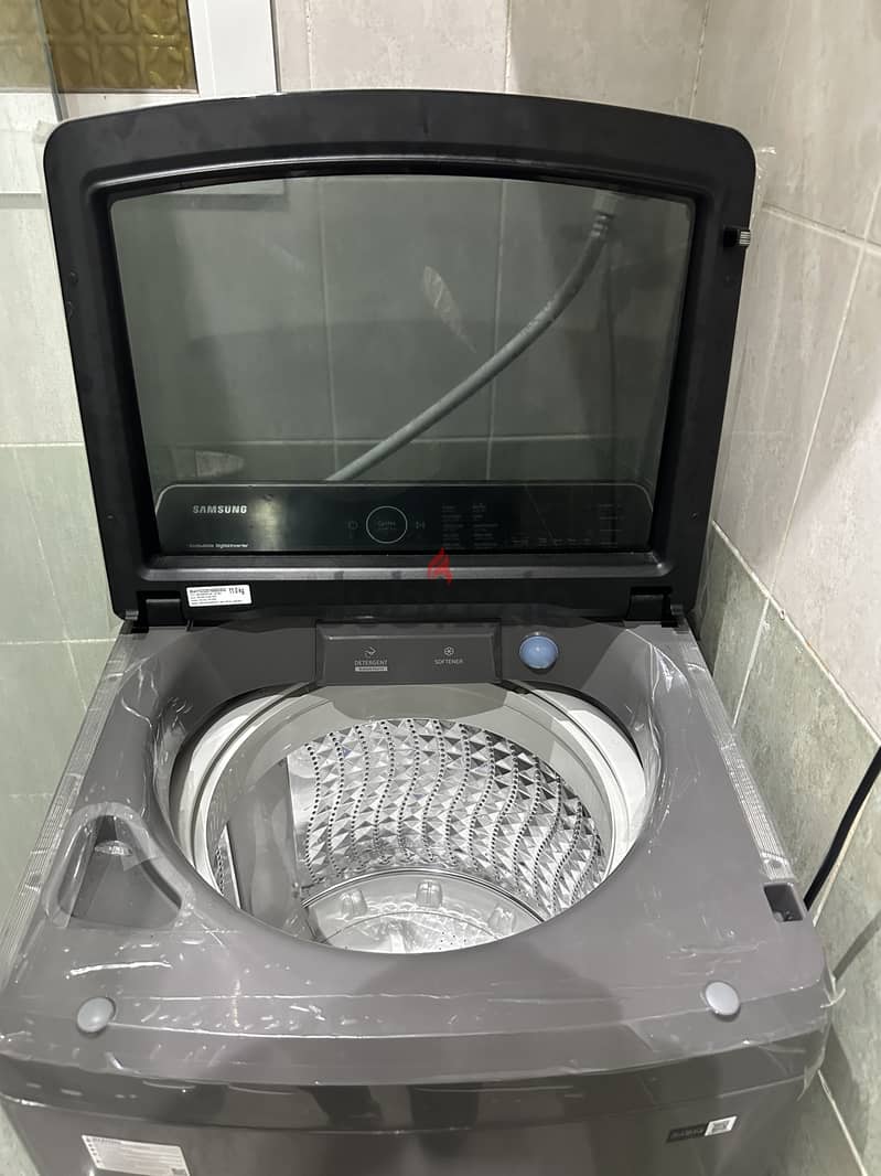 Samsung washing machine 11 kg with warranty only a year used 5