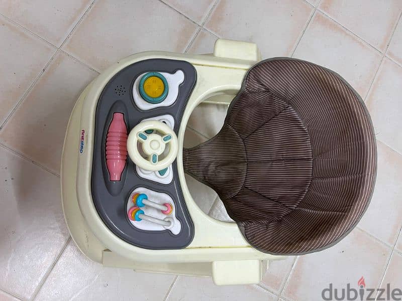 baby walker urgent for sale. . 1