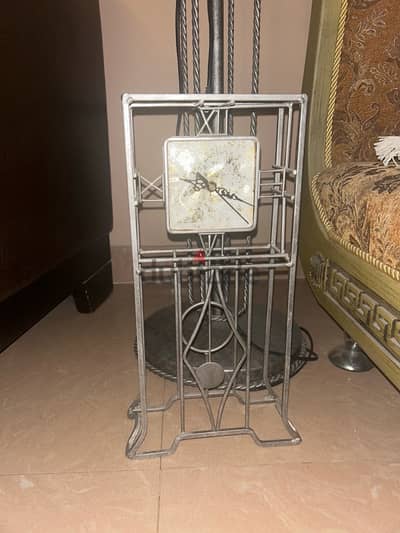 standing silver clock