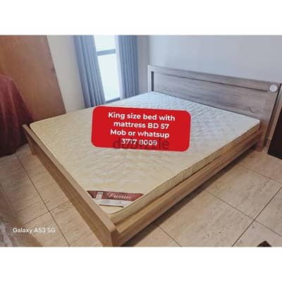 King size bed with mattress and other household items for sale with