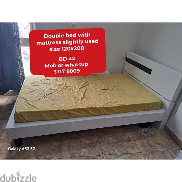 King size bed with mattress and other household items for sale with 12