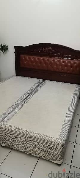 double bed with side table