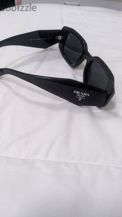 oragnial Prada glasses in 65BD for men