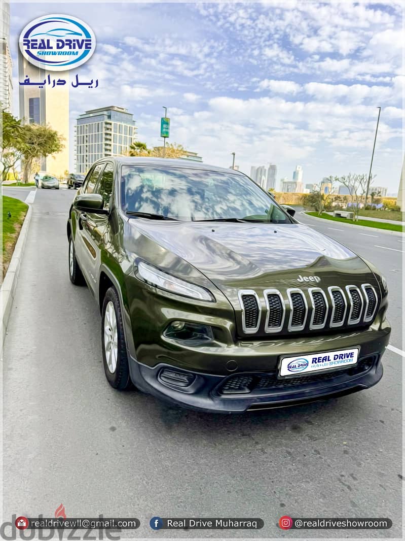 Jeep Cherokee Sport-2015-2.4L V4 -Green 106000. CLEAN CAR FOR SALE 1