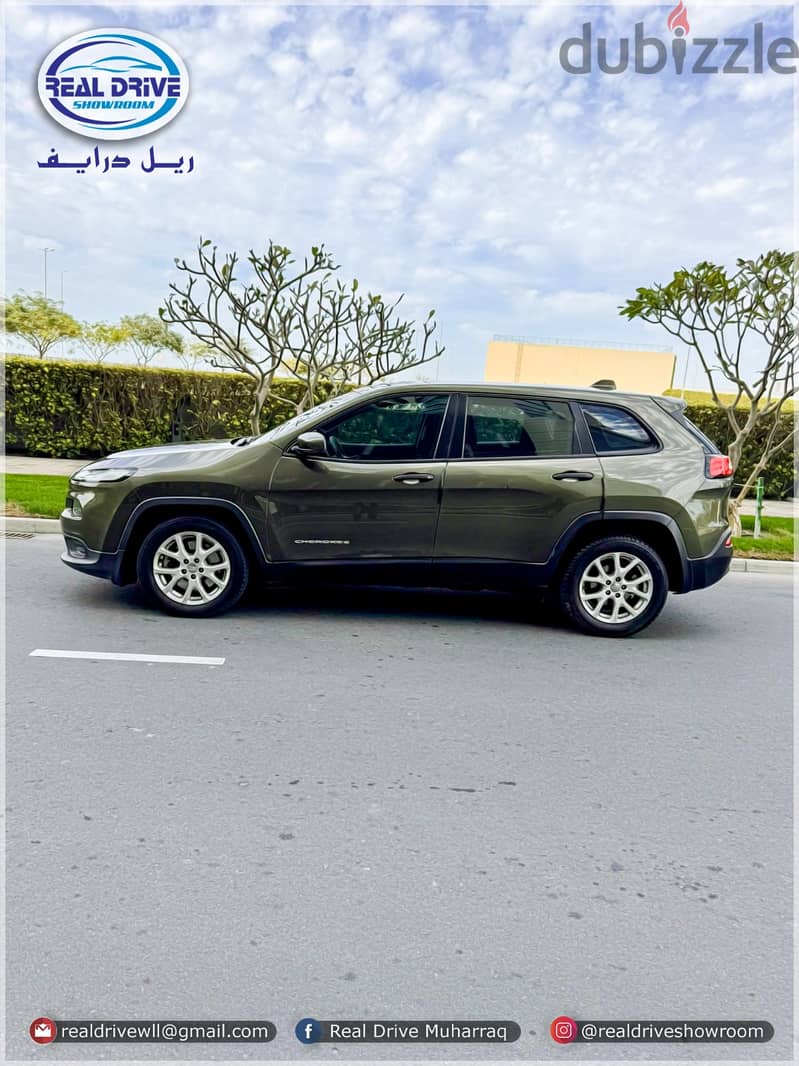 Jeep Cherokee Sport-2015-2.4L V4 -Green 106000. CLEAN CAR FOR SALE 3