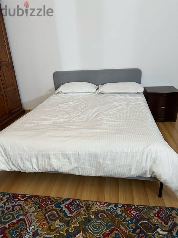 bed with mattress and one side table 7