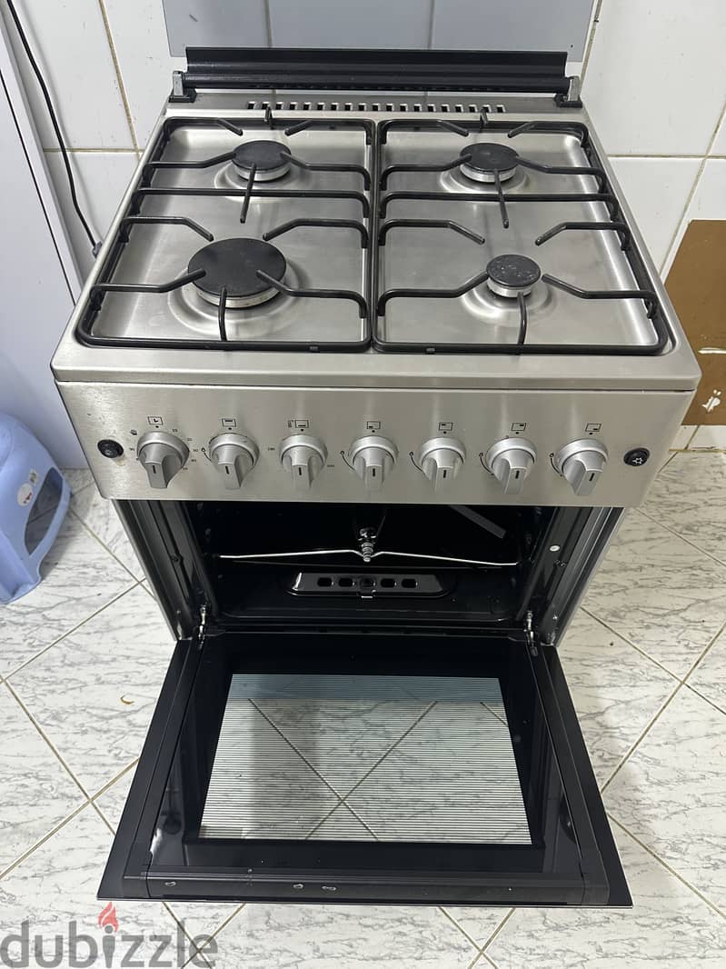 Gas stove well maintained and oven not used till now 3