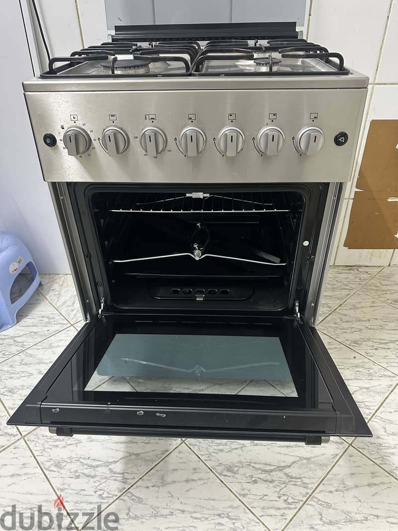 Gas stove well maintained and oven not used till now 5