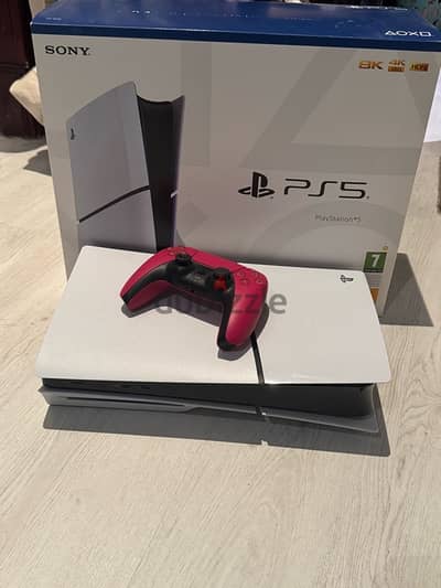 Playstation 5 slim cd with a red controller