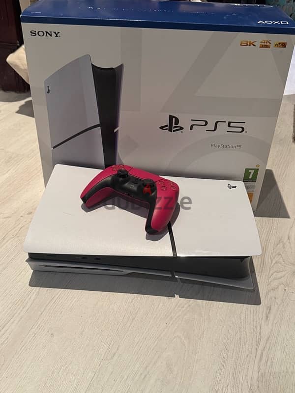 Playstation 5 slim cd with a red controller 0