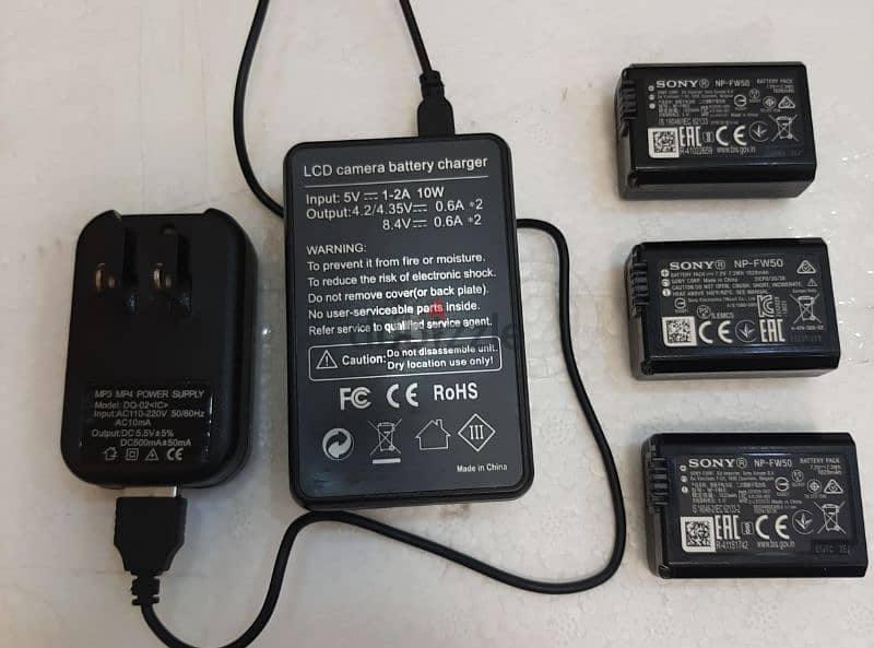 ORIGINAL SONY CAMERA BATTERY NP--FW 50 & CARJER FOR SALE 11