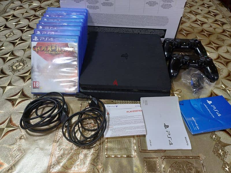 Ps4 slim like new & 8cd games & 2 original controllers with box للبيع 1