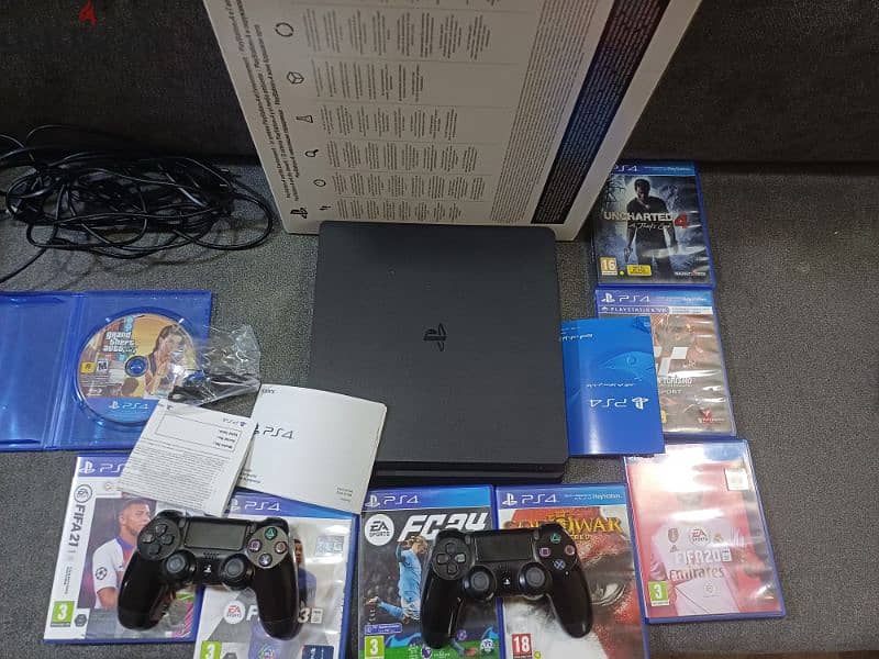 Ps4 slim like new & 8cd games & 2 original controllers with box للبيع 3