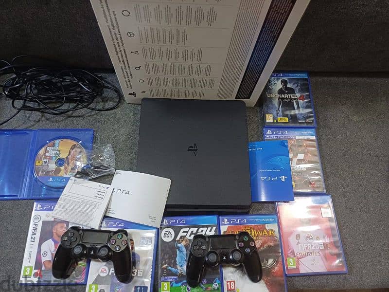 Ps4 slim like new & 8cd games & 2 original controllers with box للبيع 5