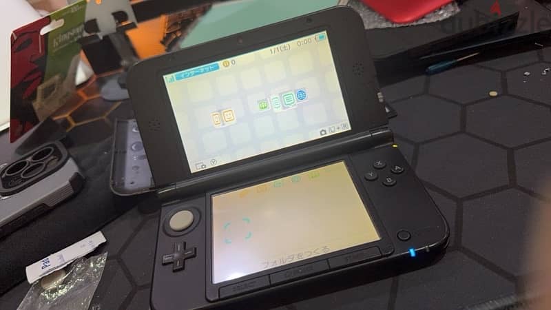 Nintendo 3ds LL Black / Red. 65 bhd. 128gb modded 2