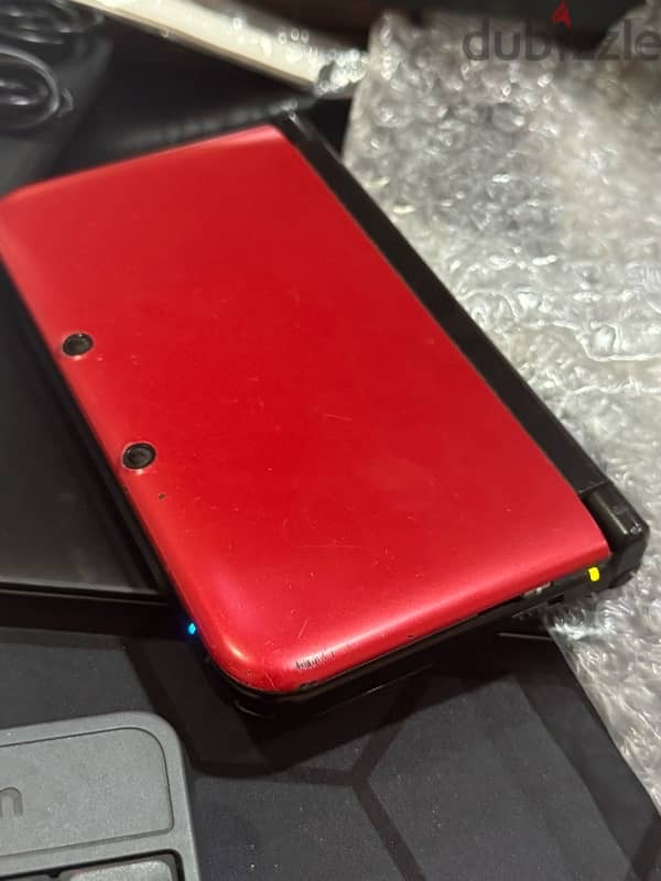 Nintendo 3ds LL Black / Red. 65 bhd. 128gb modded 4