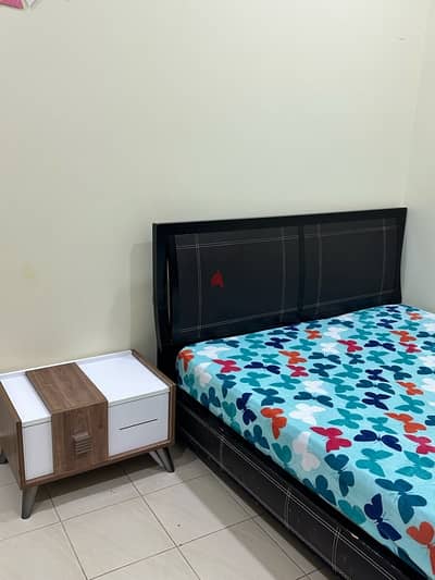 bed for sale with side table