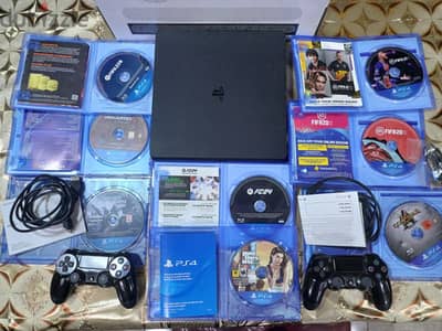 Ps4 slim like new & 8cd games & 2 original controllers with box