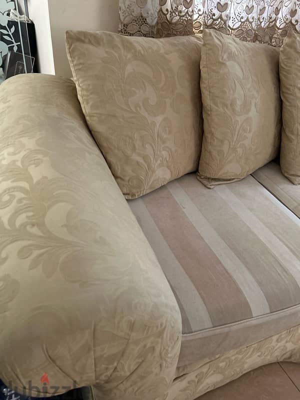2 seater beige sofas 1