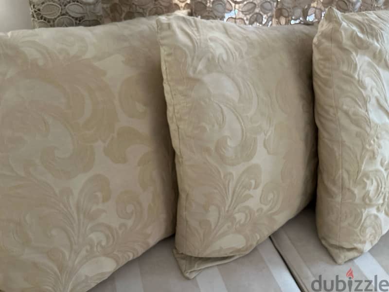 2 seater beige sofas 4