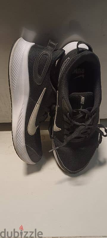 A few time used Nike running shoes for sale. 3