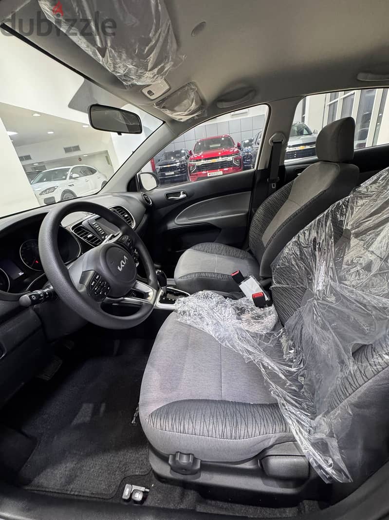 Kia Pegas 2025 White 5