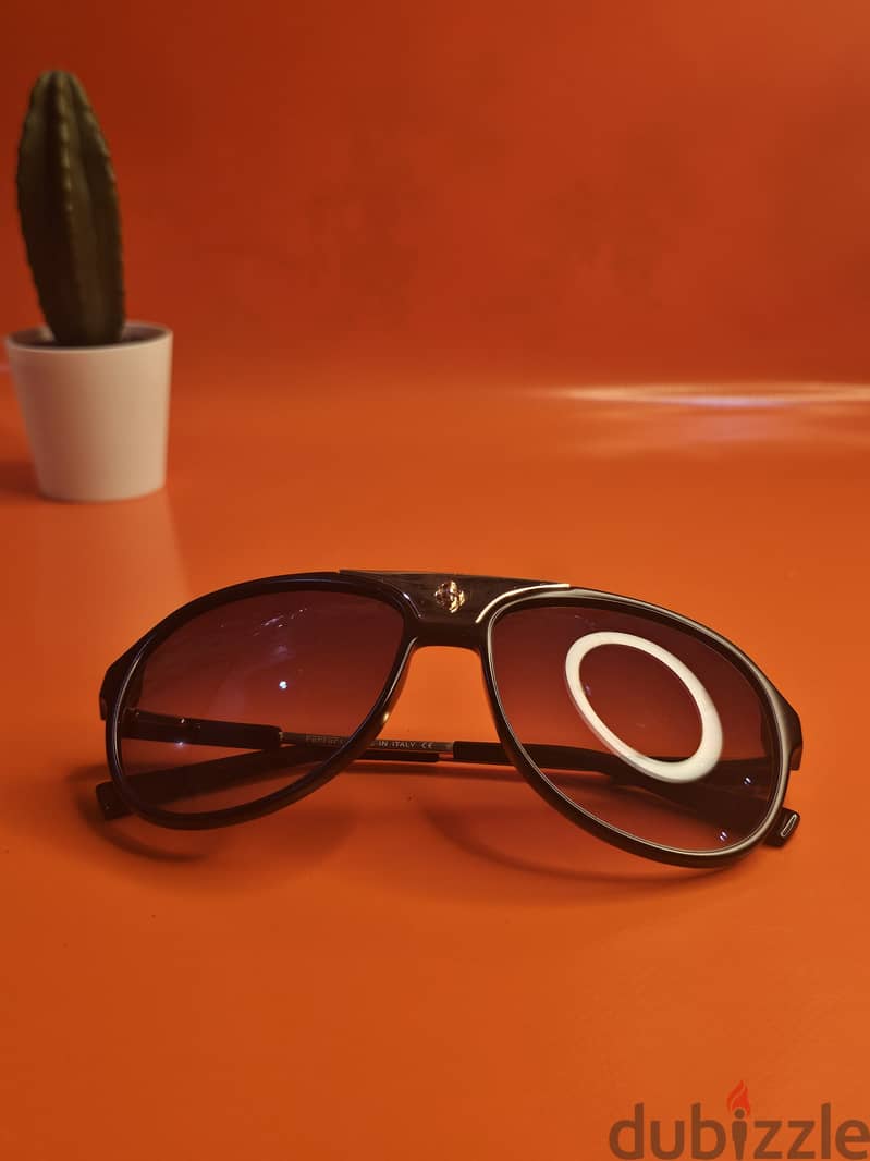 Ferrari sunglasses clean used  Style Meets Sustainability 1