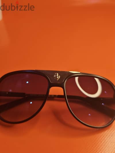 Ferrari sunglasses clean used  Style Meets Sustainability