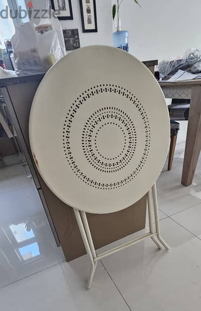 Foldable table and 2 chairs in good condition with small bbq set