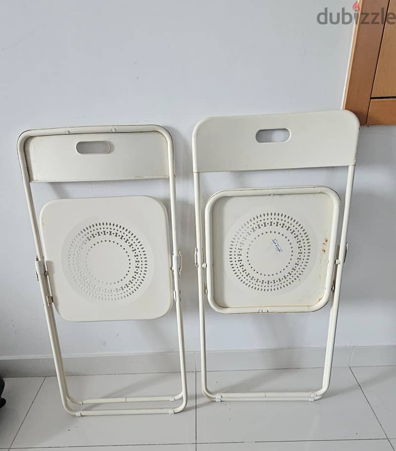 Foldable table and 2 chairs in good condition with small bbq set 1