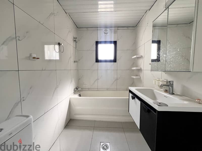 2BR Apartment | Saar | Semi‑Furnished | Garden & Facilities 9