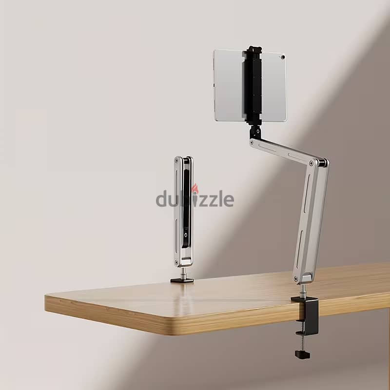A three-axis cantilever stand that can hold two mobile phones or . . . . . 1