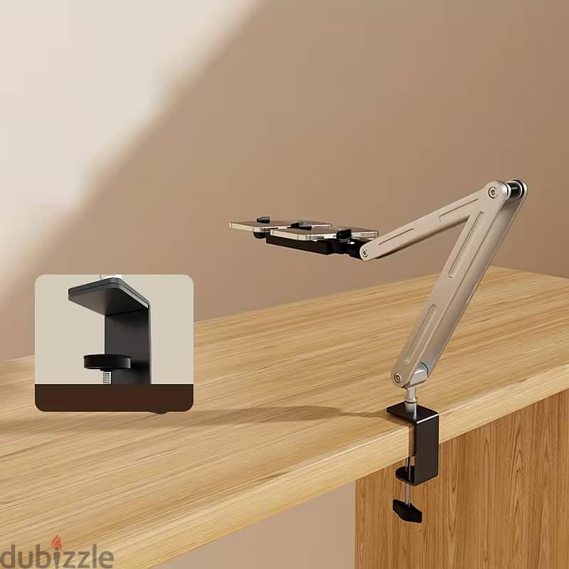 A three-axis cantilever stand that can hold two mobile phones or . . . . . 2