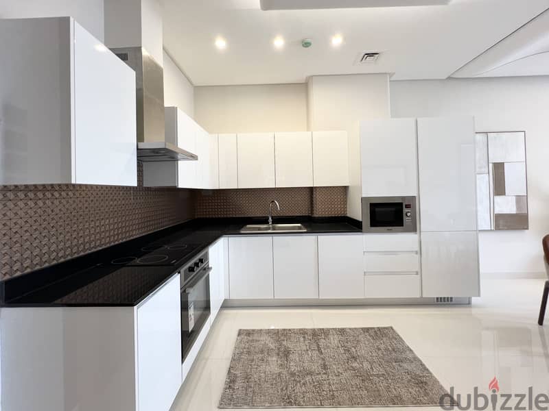 Furnished 1BR Apartment Close to Bahrain Mall | Balcony | EWA Included 3