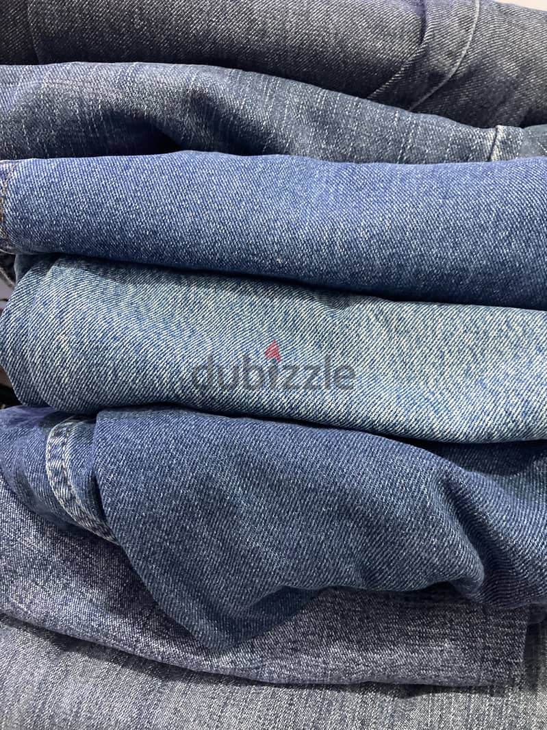 Bulk Branded blue jeans for sale all together for 10BD 1