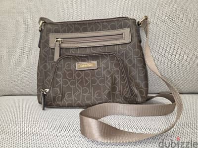 Calvin klein cross body small,brown color