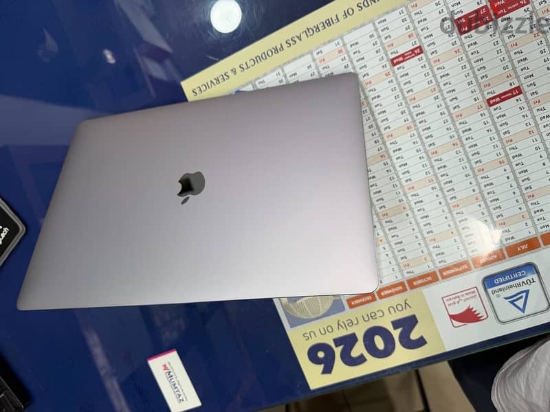 MacBook pro i7 16” Display with Touch Bar 16G 512GB 4 GN Graphics 1