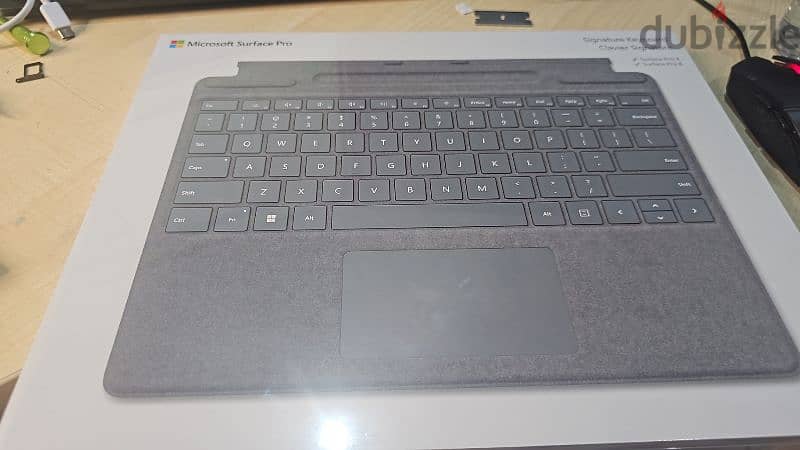 Microsoft Surface Pro keyboard and charger 1