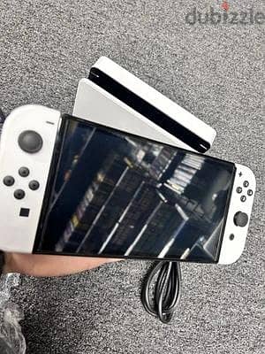 Nentindo switch OLED  Used in good condition نينتيندو سويچ نظيفة 2