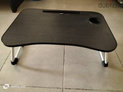 Two foldable and portable study or laptop tables