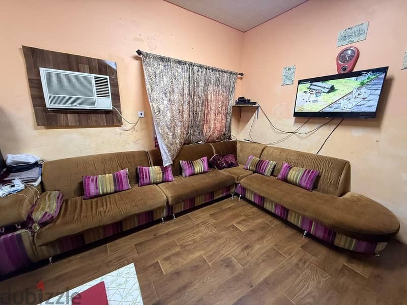 L shape sofa with cushions 2