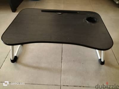 Two foldable and portable study or laptop tables