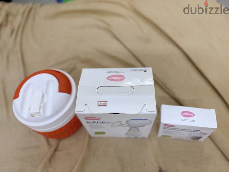 Electric Breast Pump and Breastmilk storage Bags 1