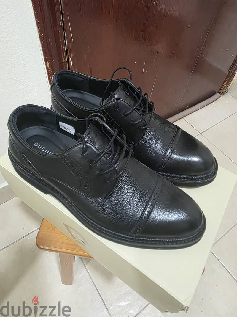 Black leather shoes 5