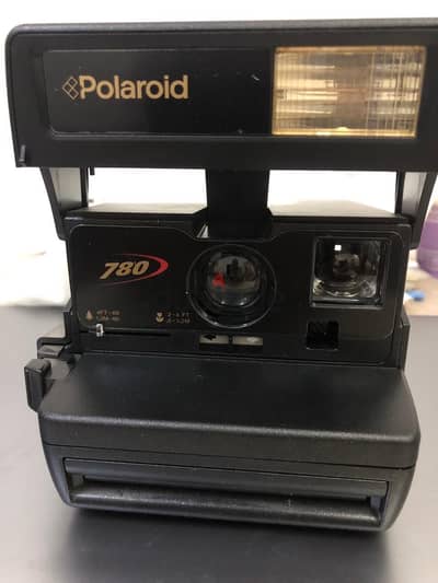 The Polaroid 780 is a vintage analog instant camera
